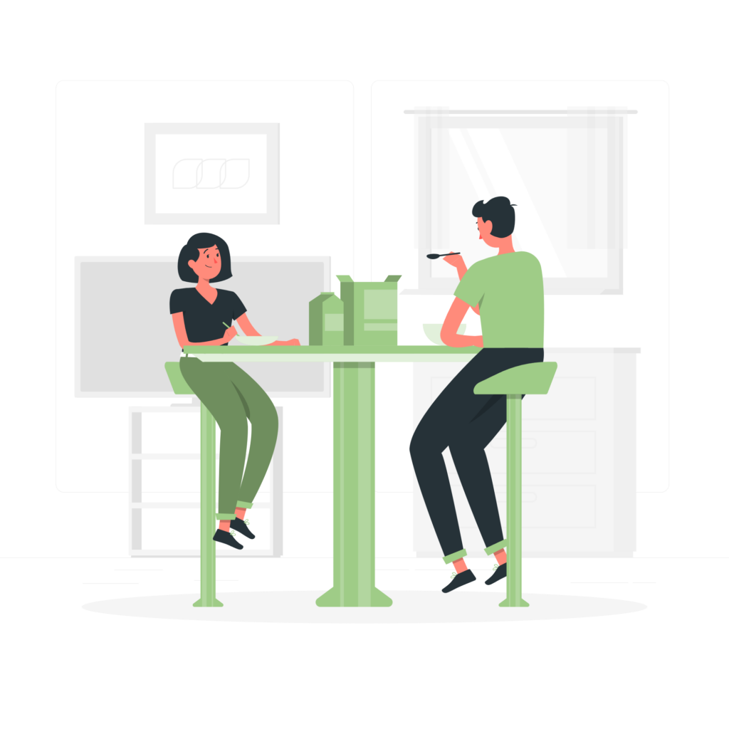 Deux personnes discutant autour d'une table dans un environnement moderne et professionnel, symbolisant un échange collaboratif. Cette illustration peut représenter une réunion pour optimiser la gestion des processus avec Sage X3 dans le secteur agroalimentaire.